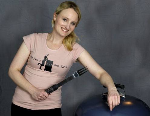 Die Frau am Grill