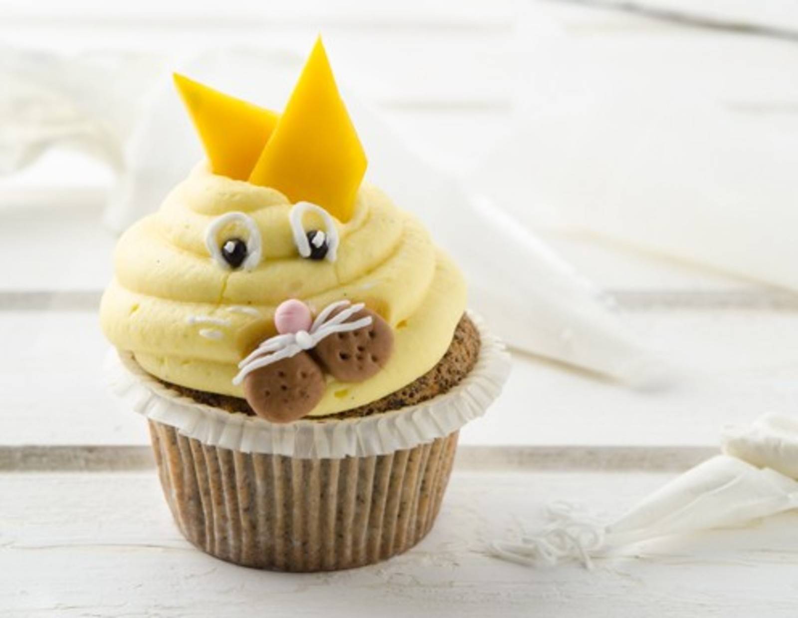 Mohn-Cupcakes mit Mangotopping Rezept